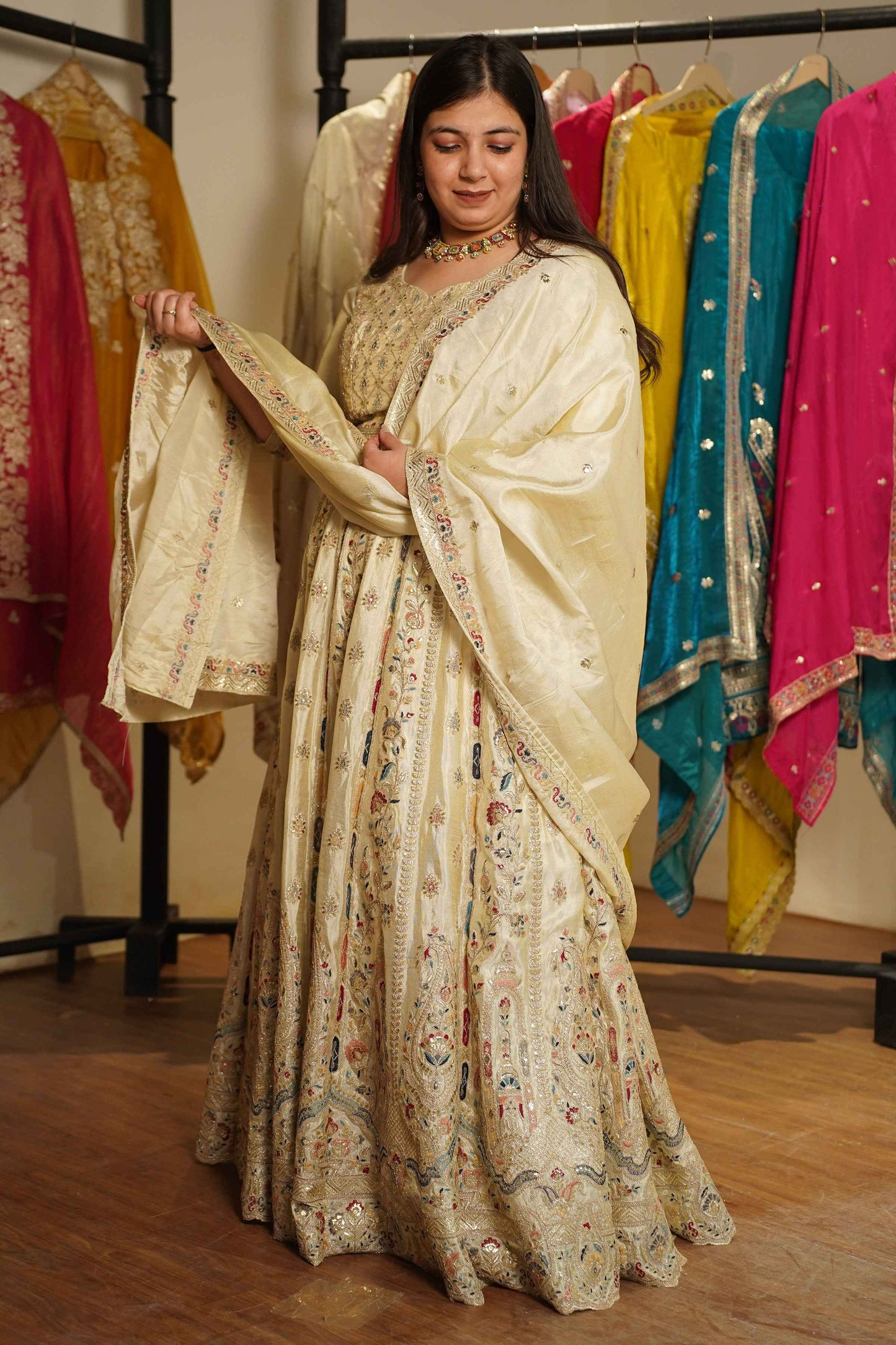Zareen Ivory Tissue Lehenga With Zari Embroidery