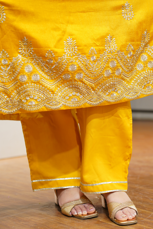 Laddu Peela Embroidered Fancy Suit