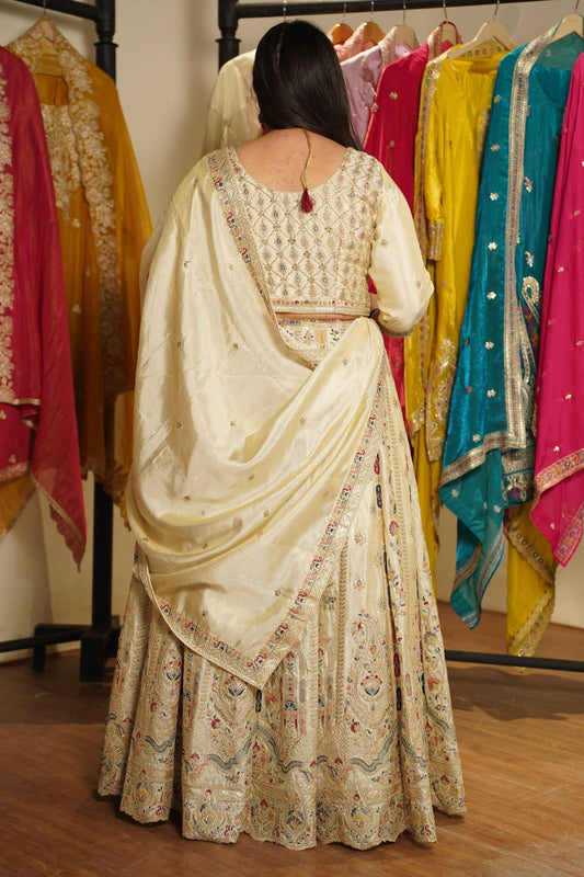 Zareen Ivory Tissue Lehenga With Zari Embroidery