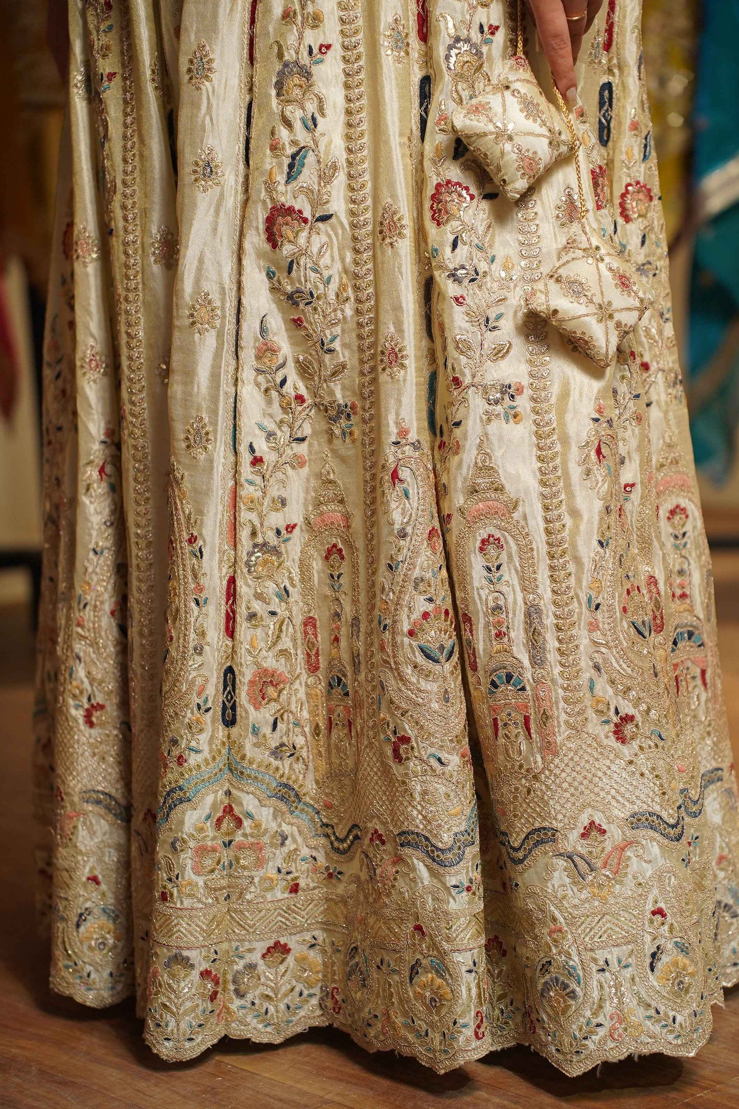 Zareen Ivory Tissue Lehenga With Zari Embroidery