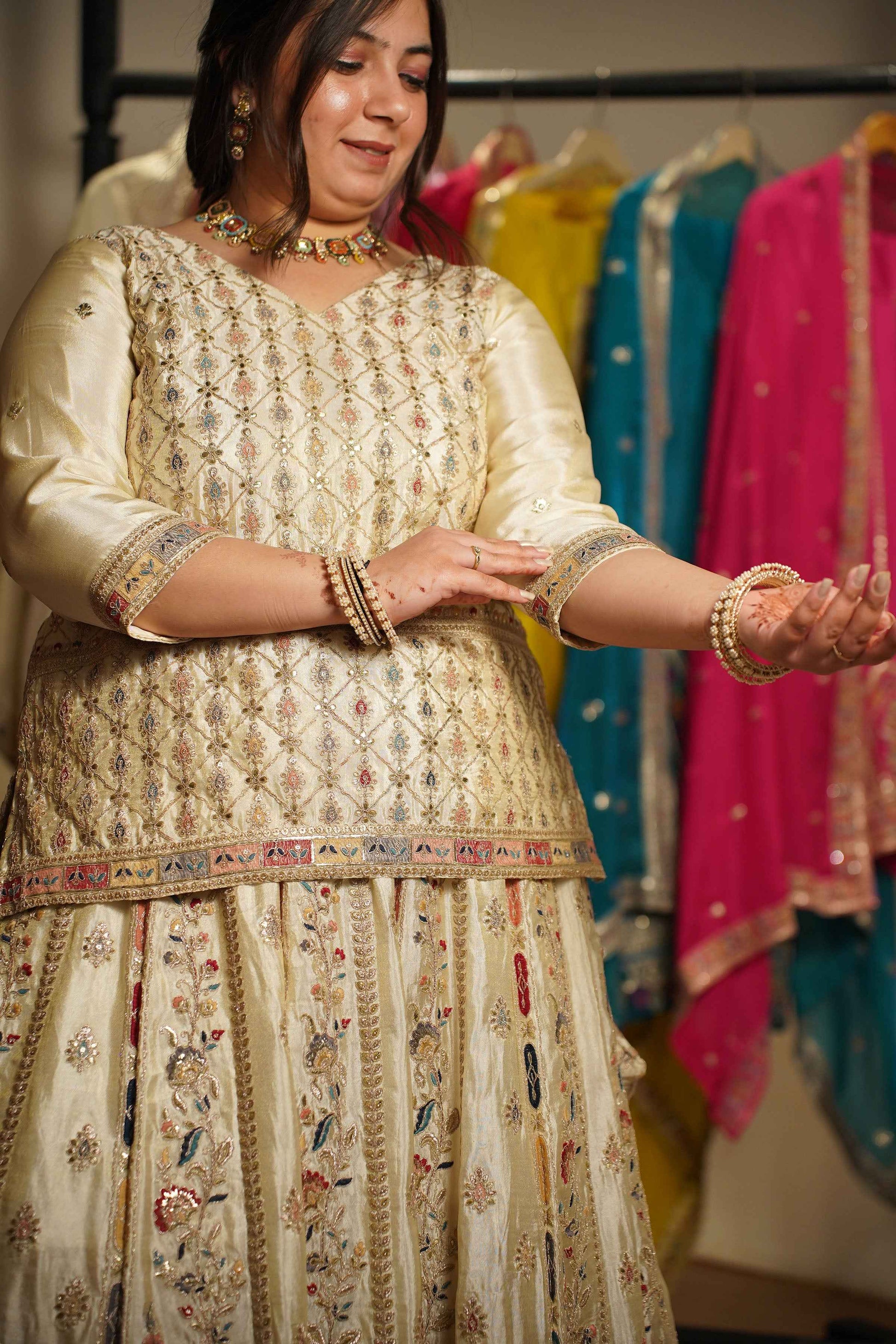 Zareen Ivory Tissue Zari Embroidered Lehenga Choli