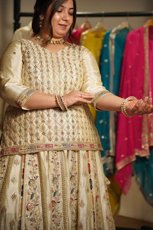 Zareen Ivory Tissue Zari Embroidered Lehenga Choli
