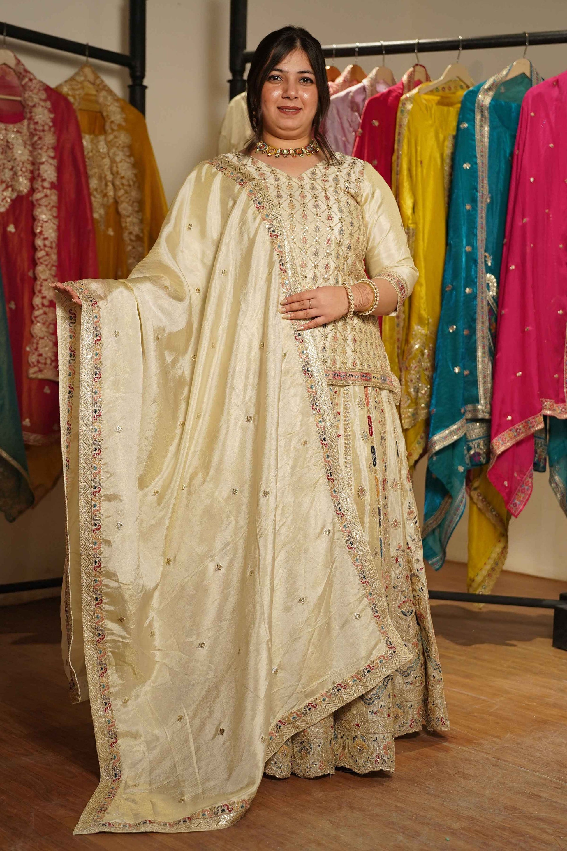 Zareen Ivory Tissue Zari Embroidered Lehenga Choli