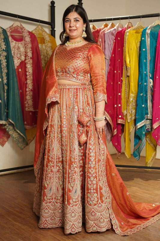 Mehzara Rust Tissue Lehenga With Zari Embroidery