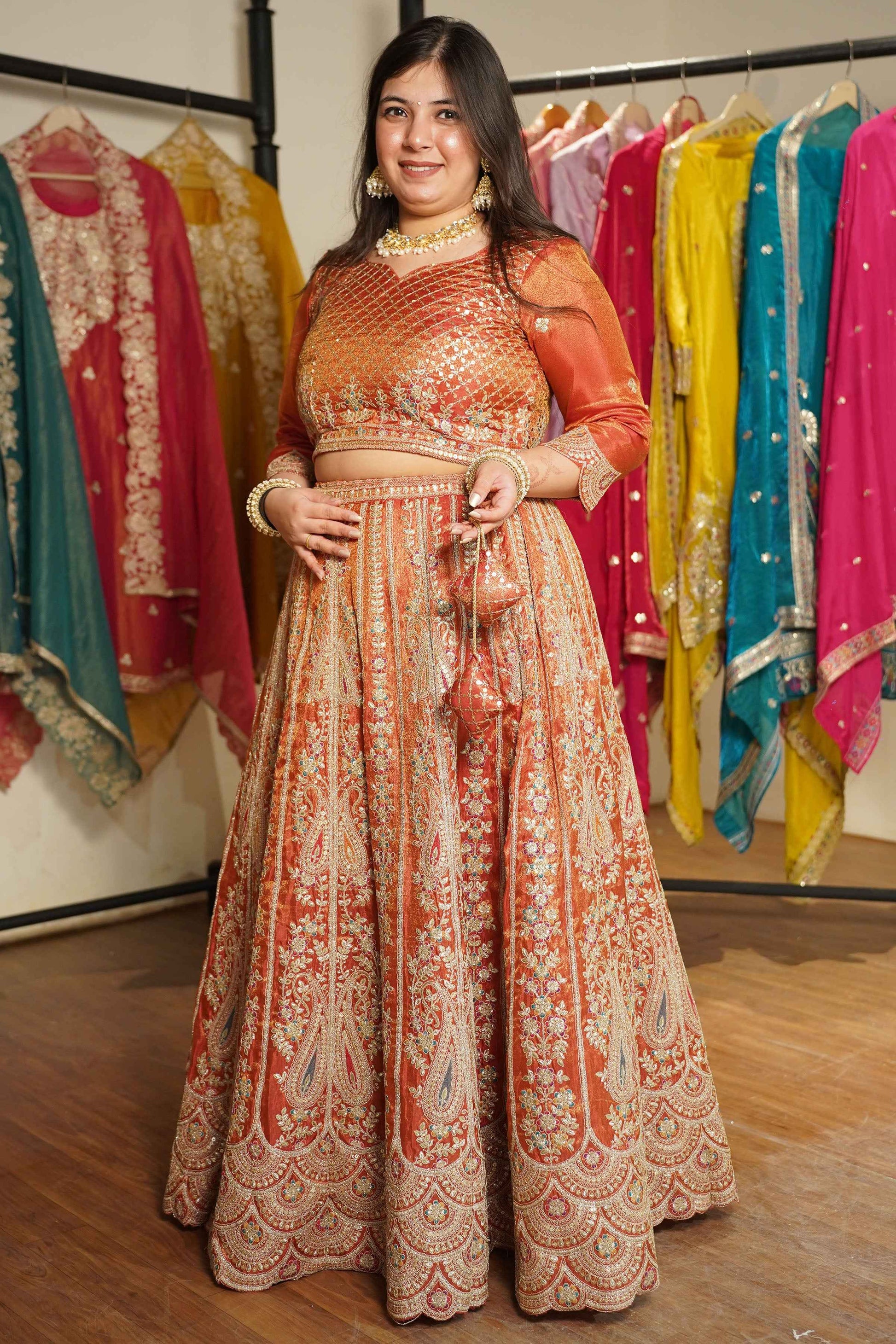 Mehzara Rust Tissue Lehenga With Zari Embroidery