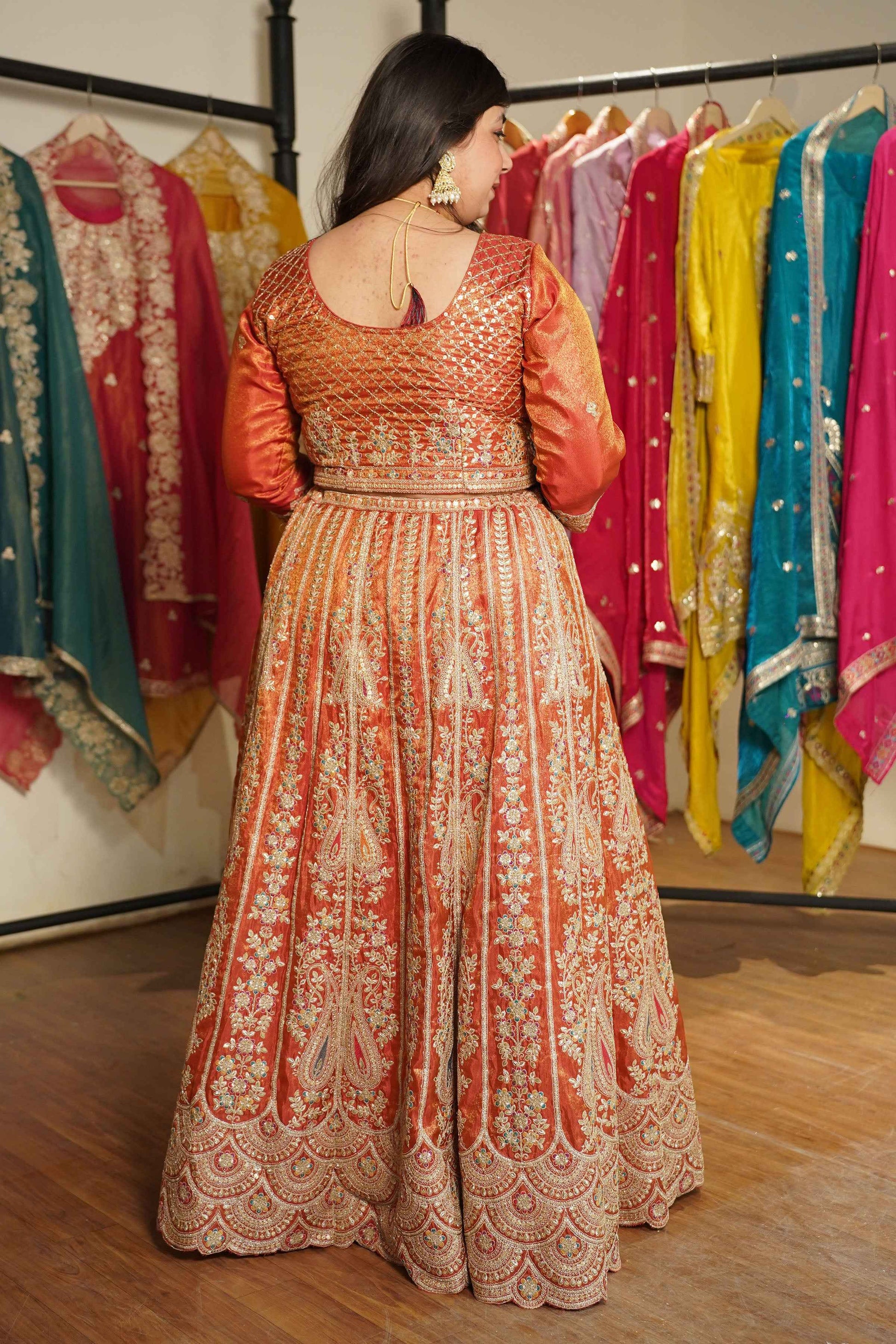 Mehzara Rust Tissue Lehenga With Zari Embroidery