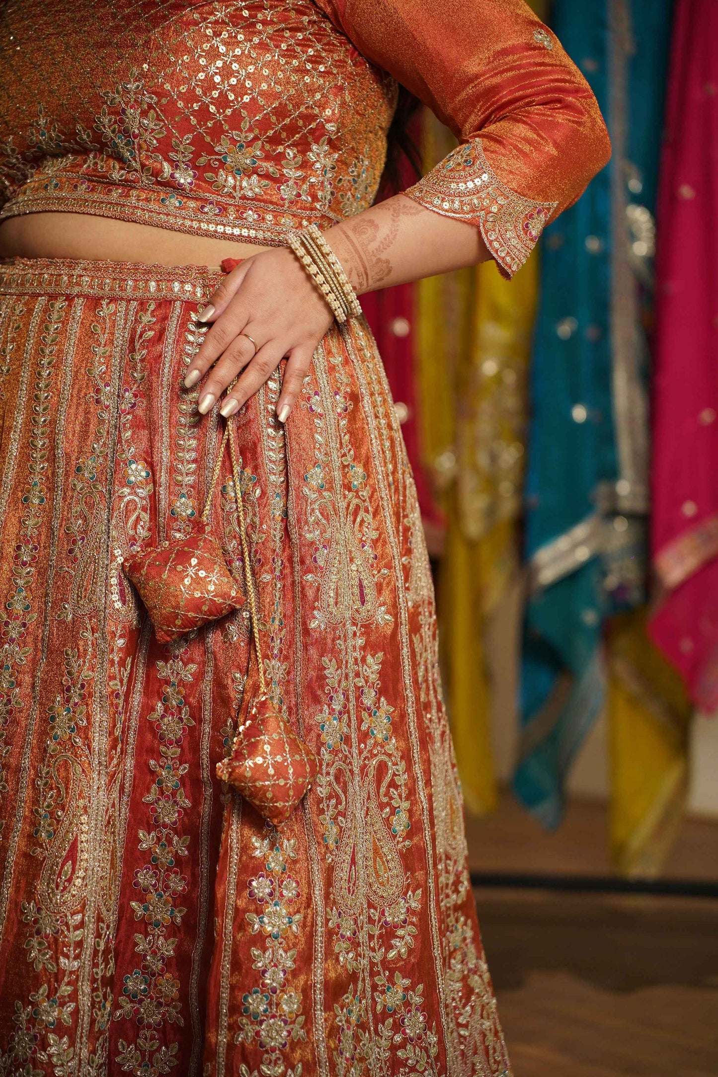 Mehzara Rust Tissue Lehenga With Zari Embroidery