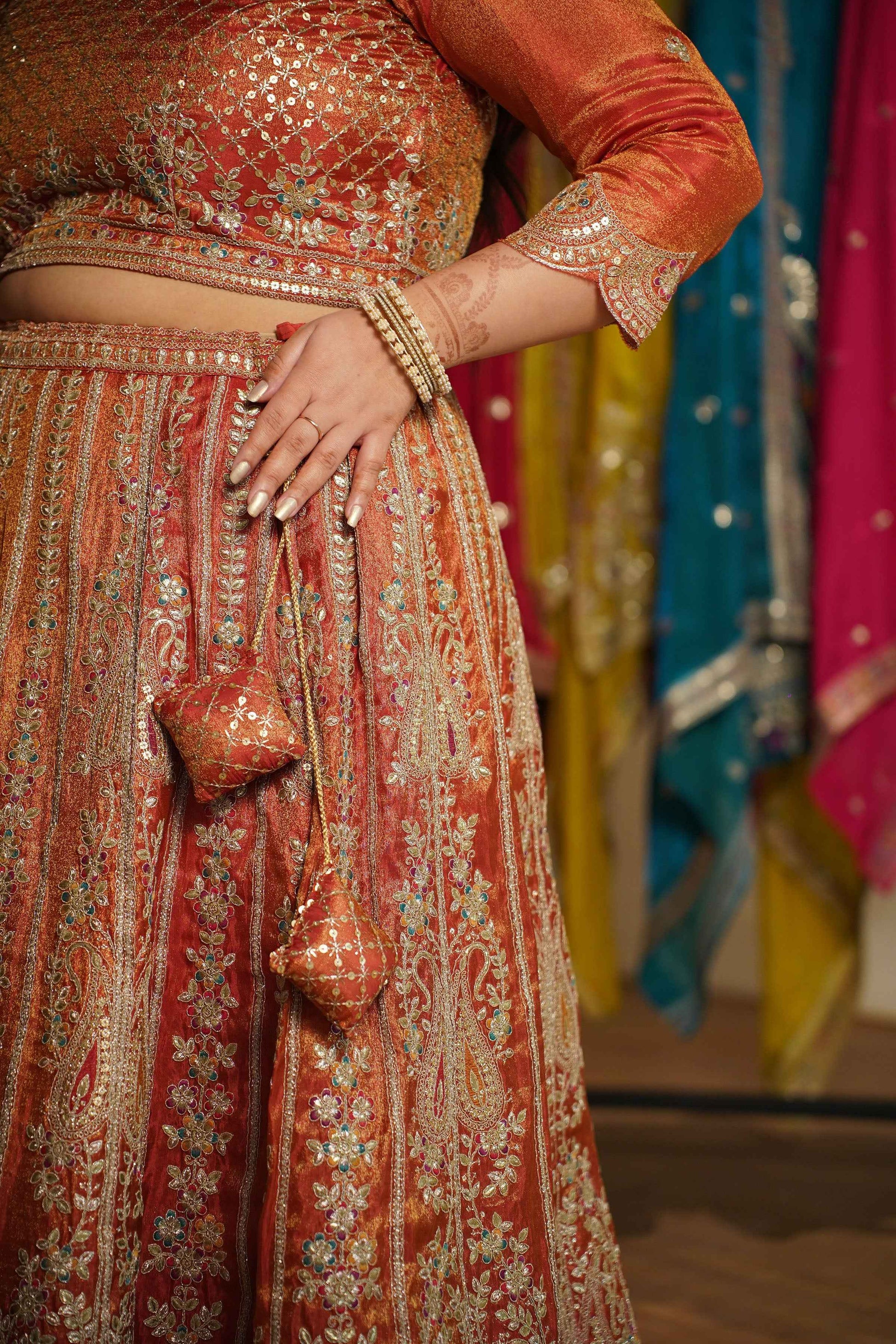 Mehzara Rust Tissue Lehenga With Zari Embroidery