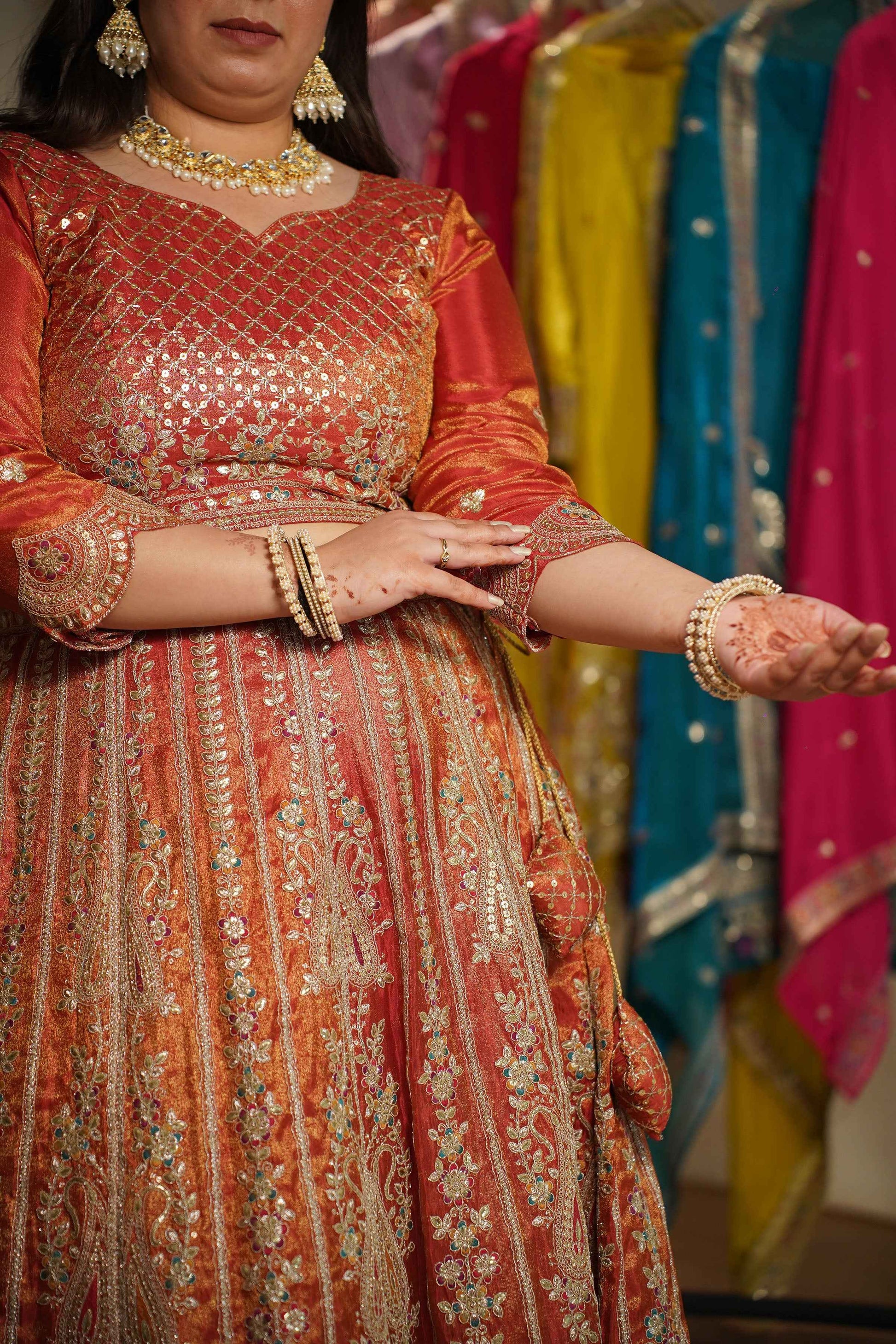 Mehzara Rust Tissue Lehenga With Zari Embroidery