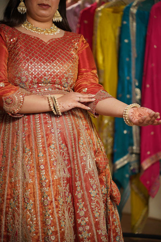 Mehzara Rust Tissue Lehenga With Zari Embroidery