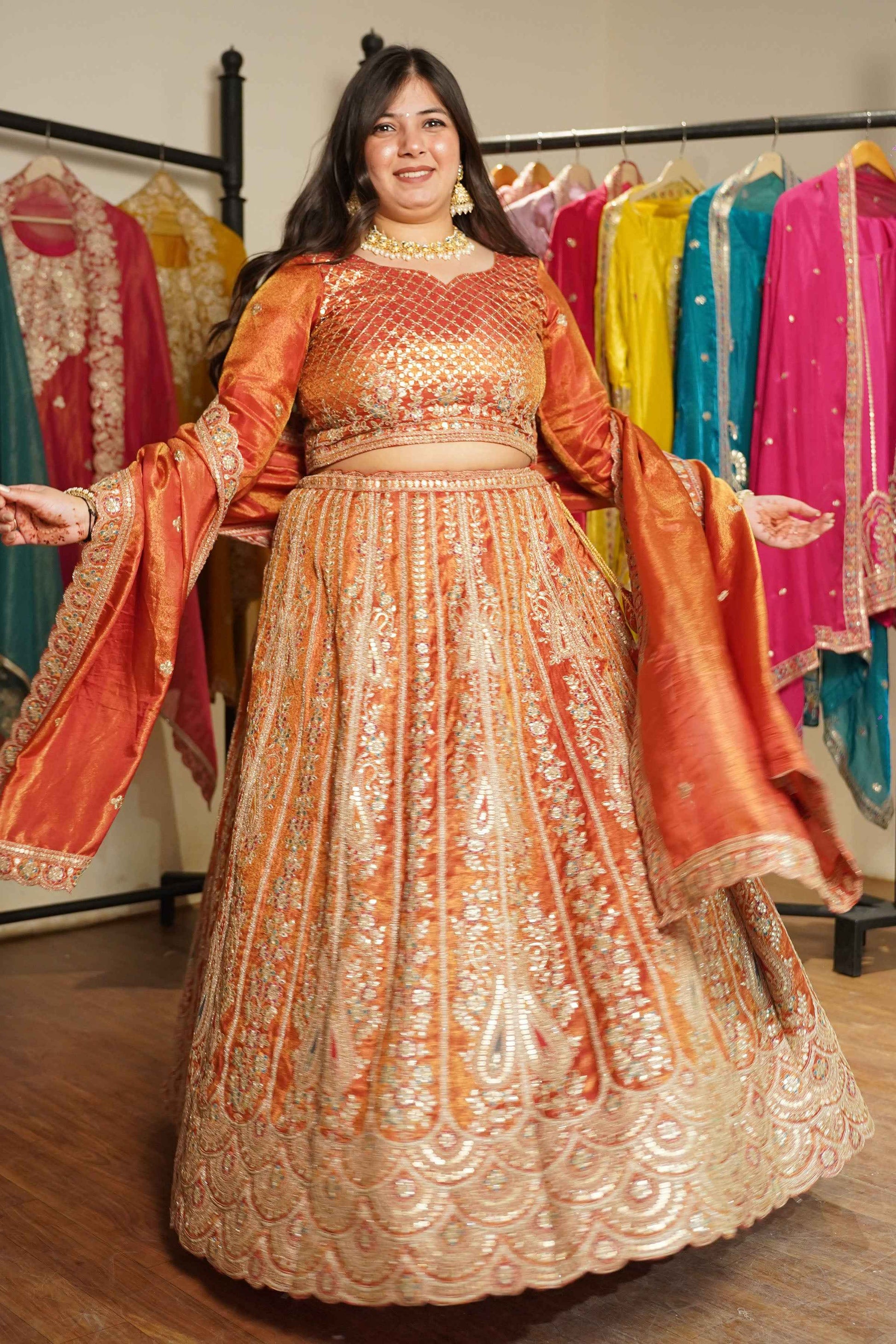 Mehzara Rust Tissue Lehenga With Zari Embroidery