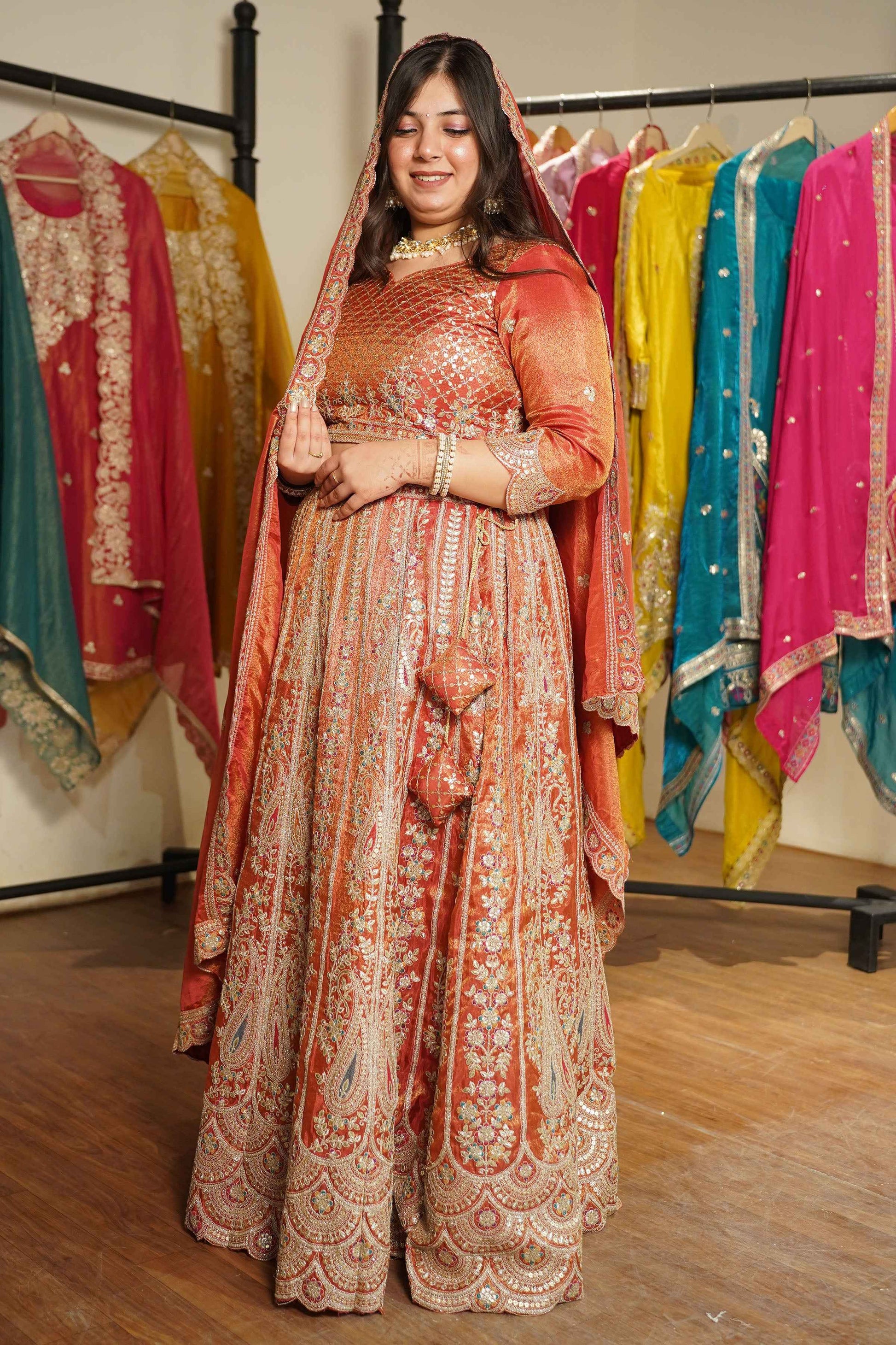 Mehzara Rust Tissue Lehenga With Zari Embroidery