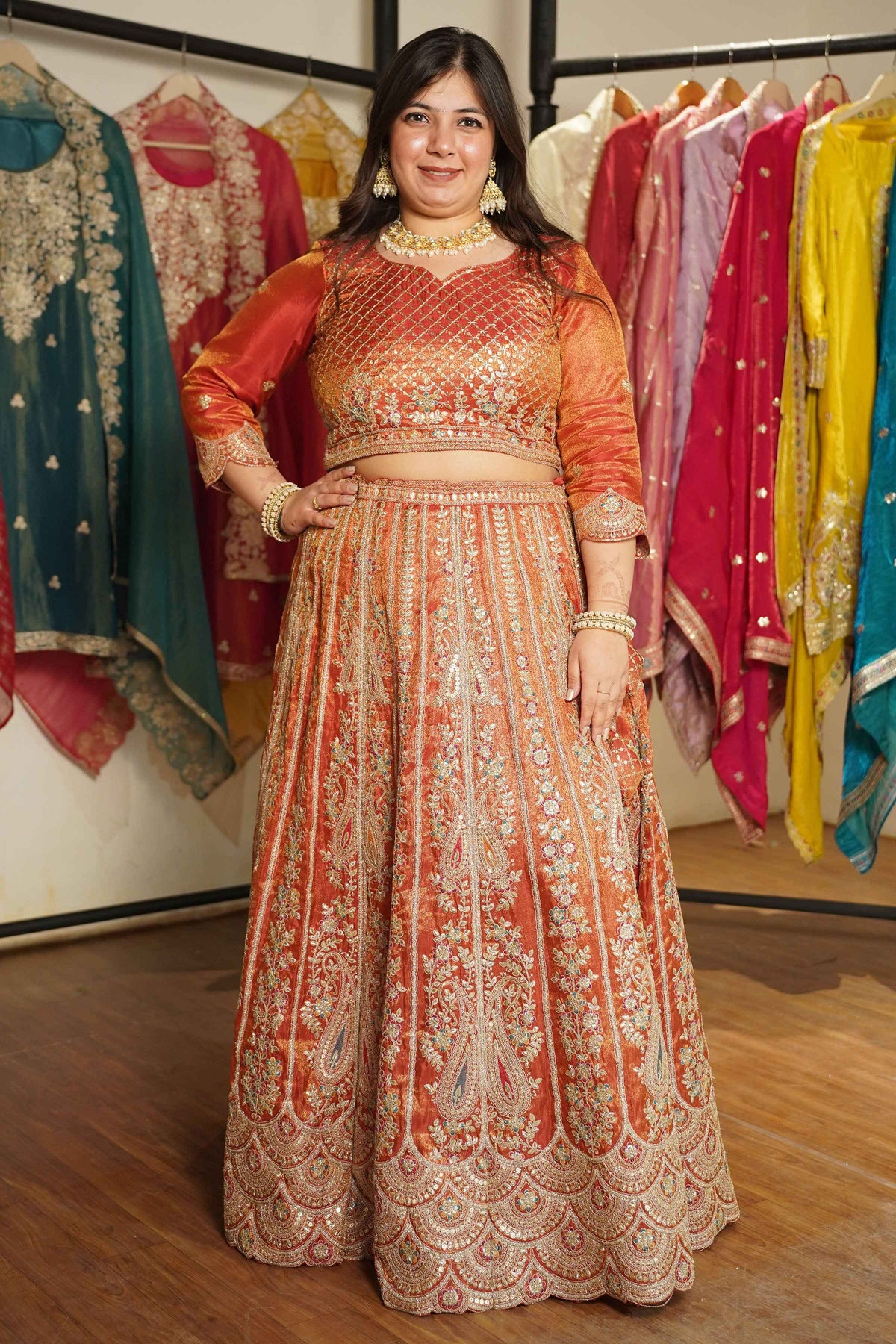 Mehzara Rust Tissue Lehenga With Zari Embroidery