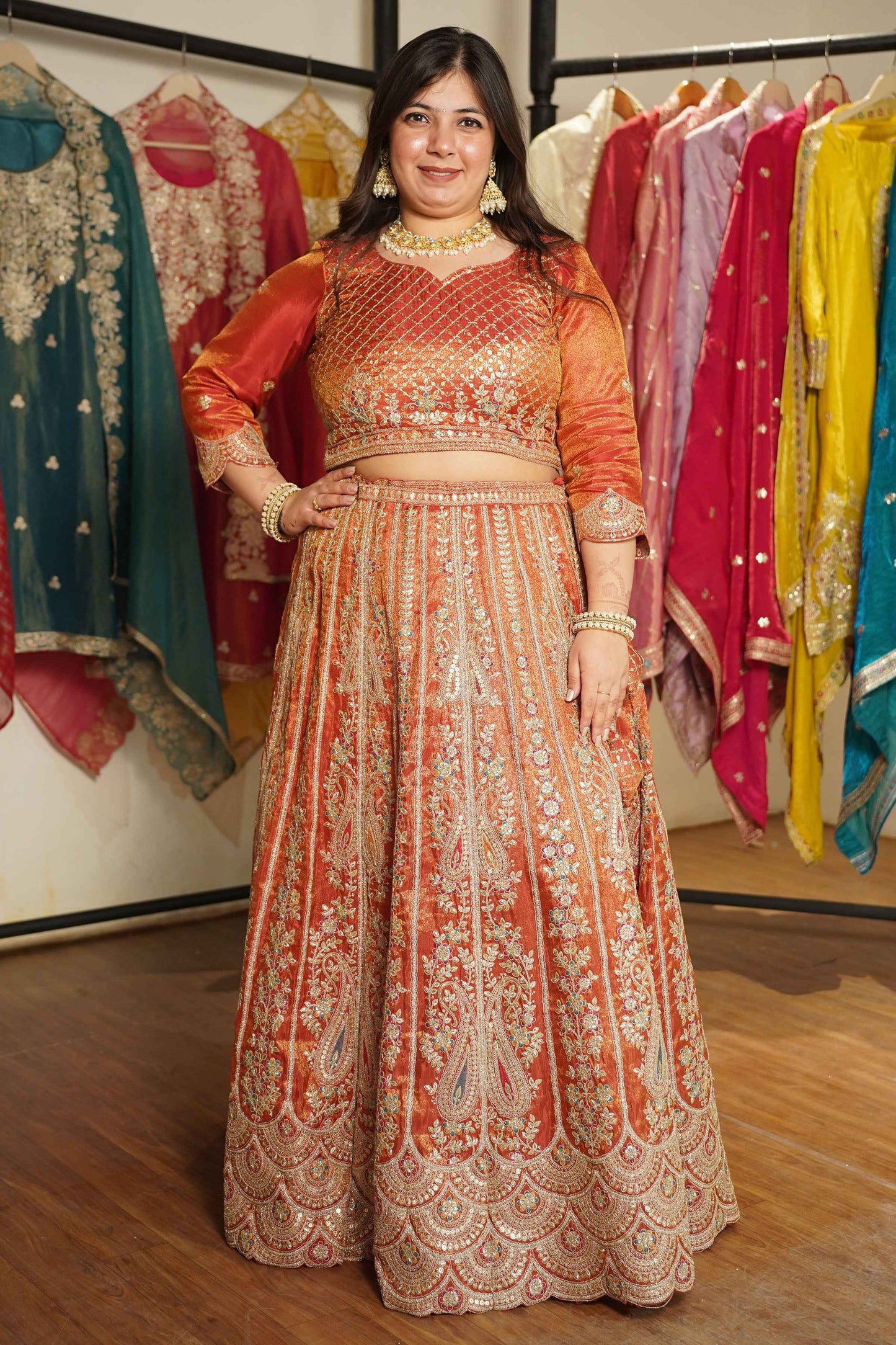 Mehzara Rust Tissue Lehenga With Zari Embroidery
