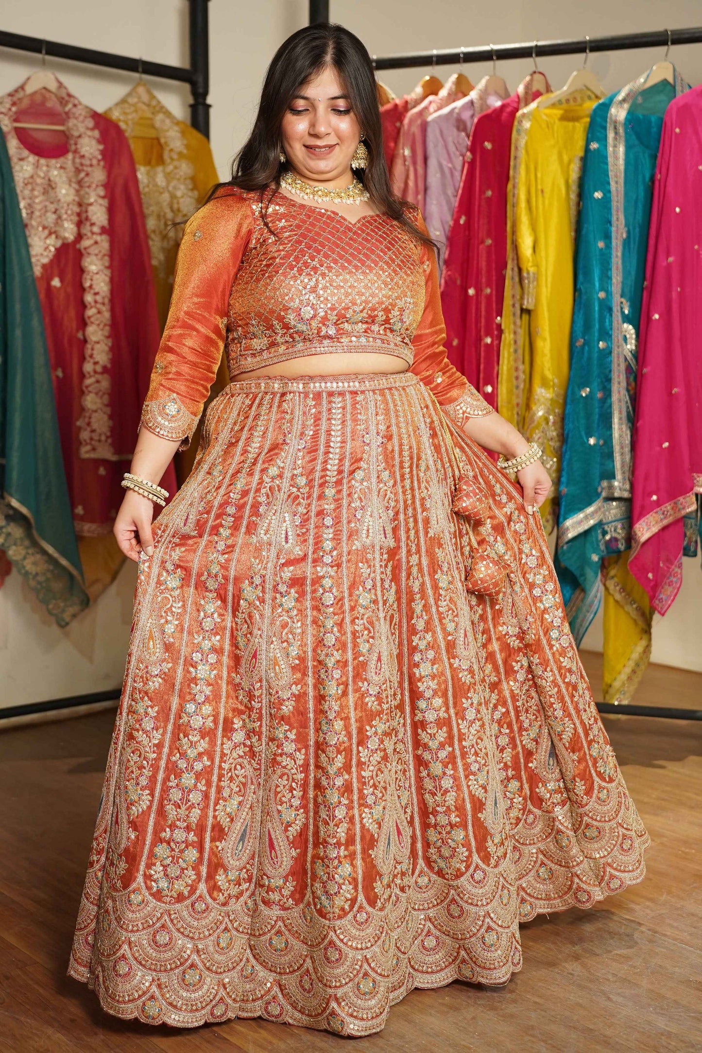 Mehzara Rust Tissue Lehenga With Zari Embroidery