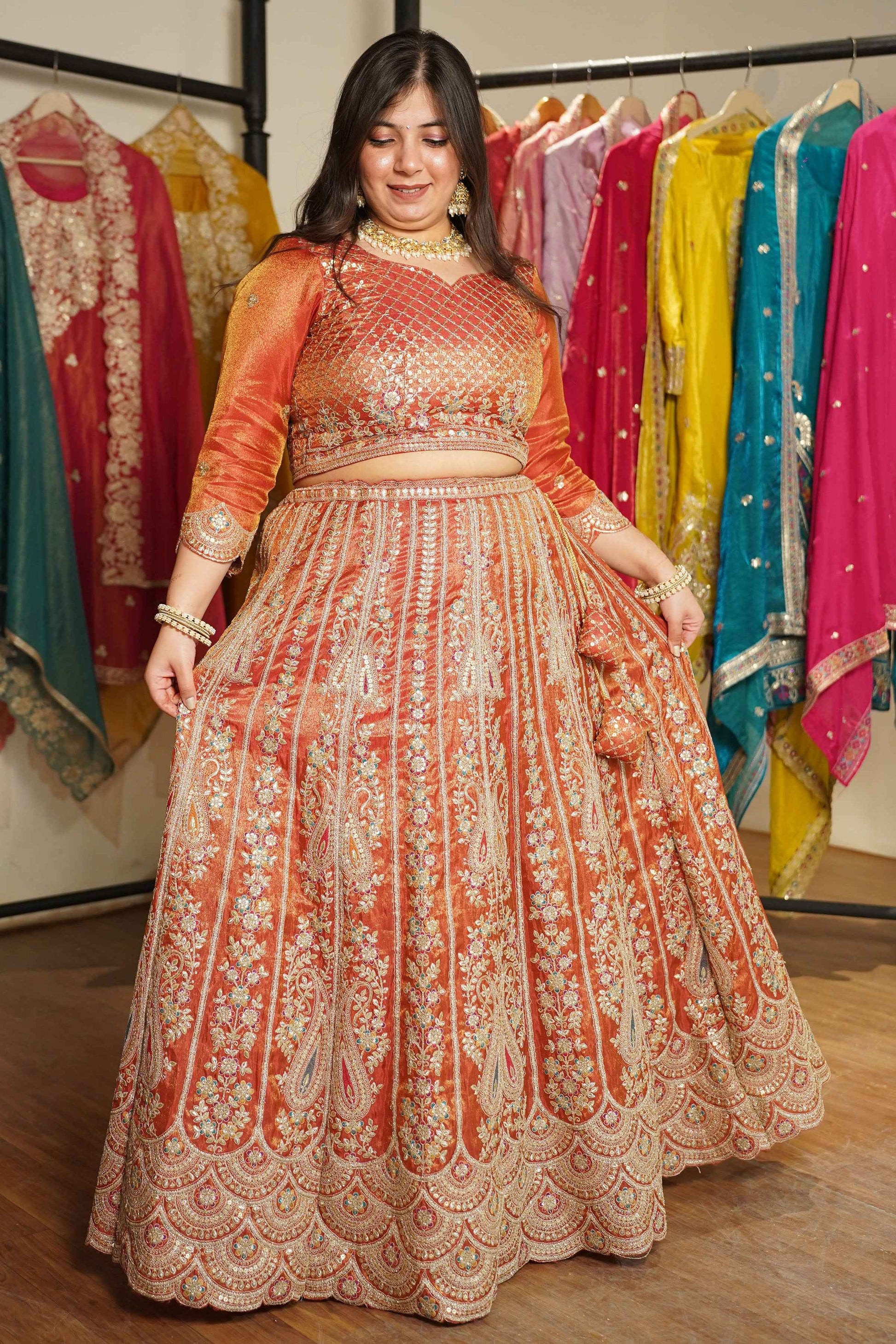Mehzara Rust Tissue Lehenga With Zari Embroidery
