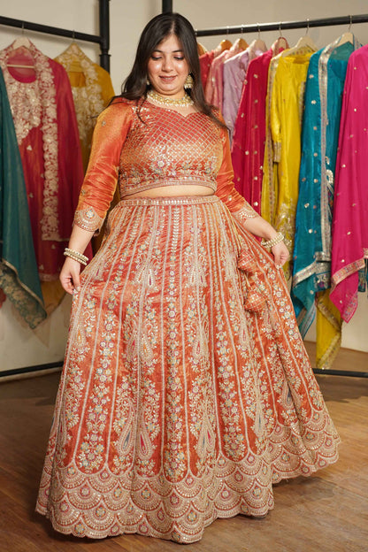 Mehzara Rust Tissue Lehenga With Zari Embroidery