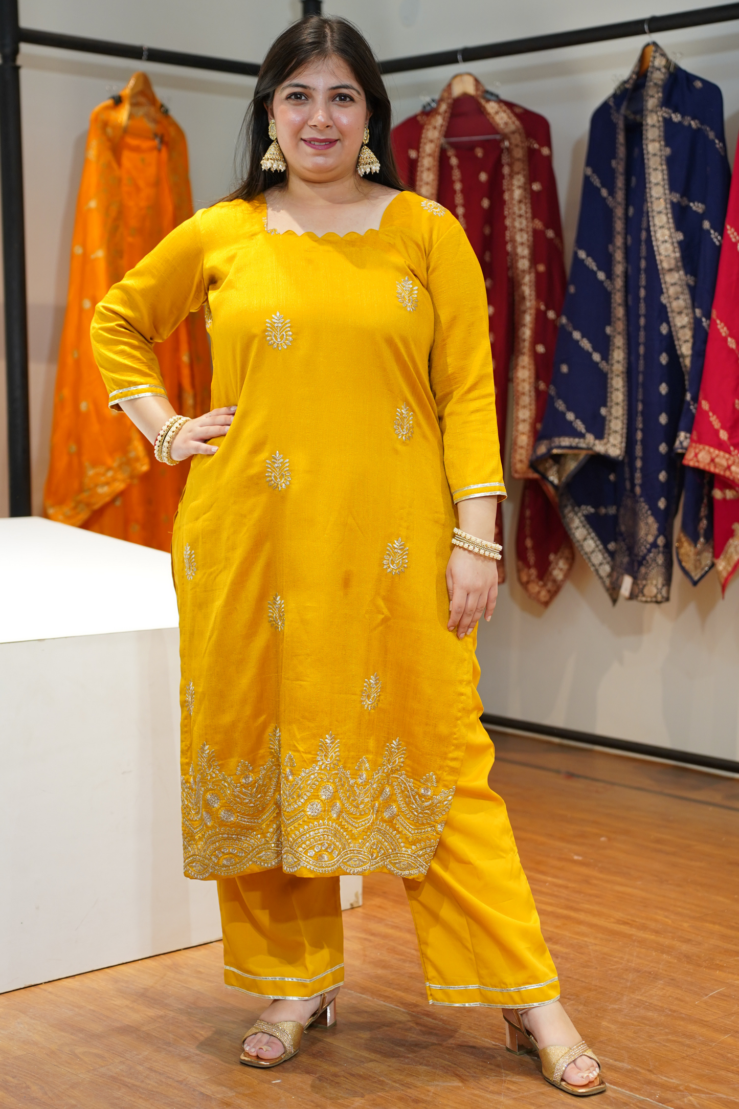 Laddu Peela Embroidered Fancy Suit