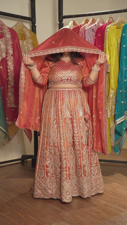 Mehzara Rust Tissue Lehenga With Zari Embroidery