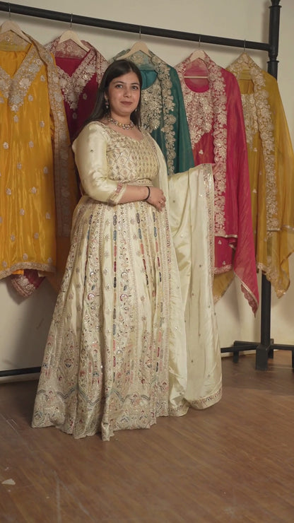 Zareen Ivory Tissue Lehenga With Zari Embroidery