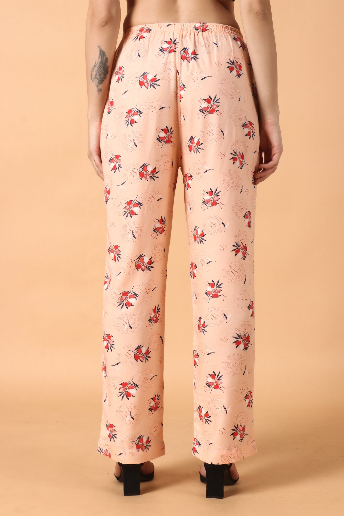 Women Plus Size Peach Printed Rayon palazzo pants for women | Apella